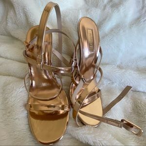 Strappy rose gold heels